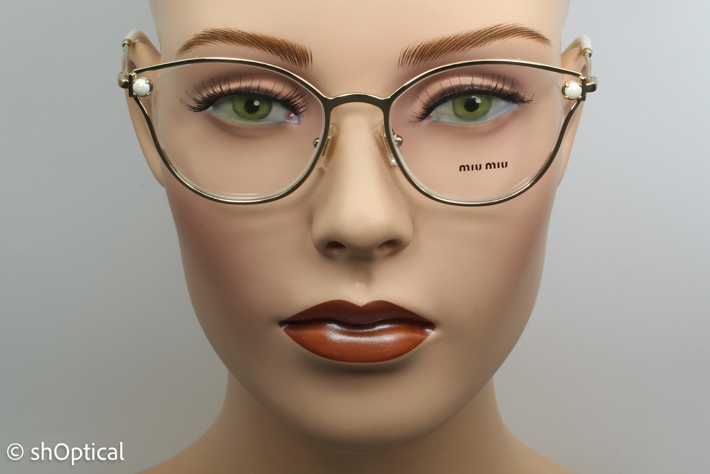 Miu Miu VMU530 Female Oval Glasses Frame Gold 50mm