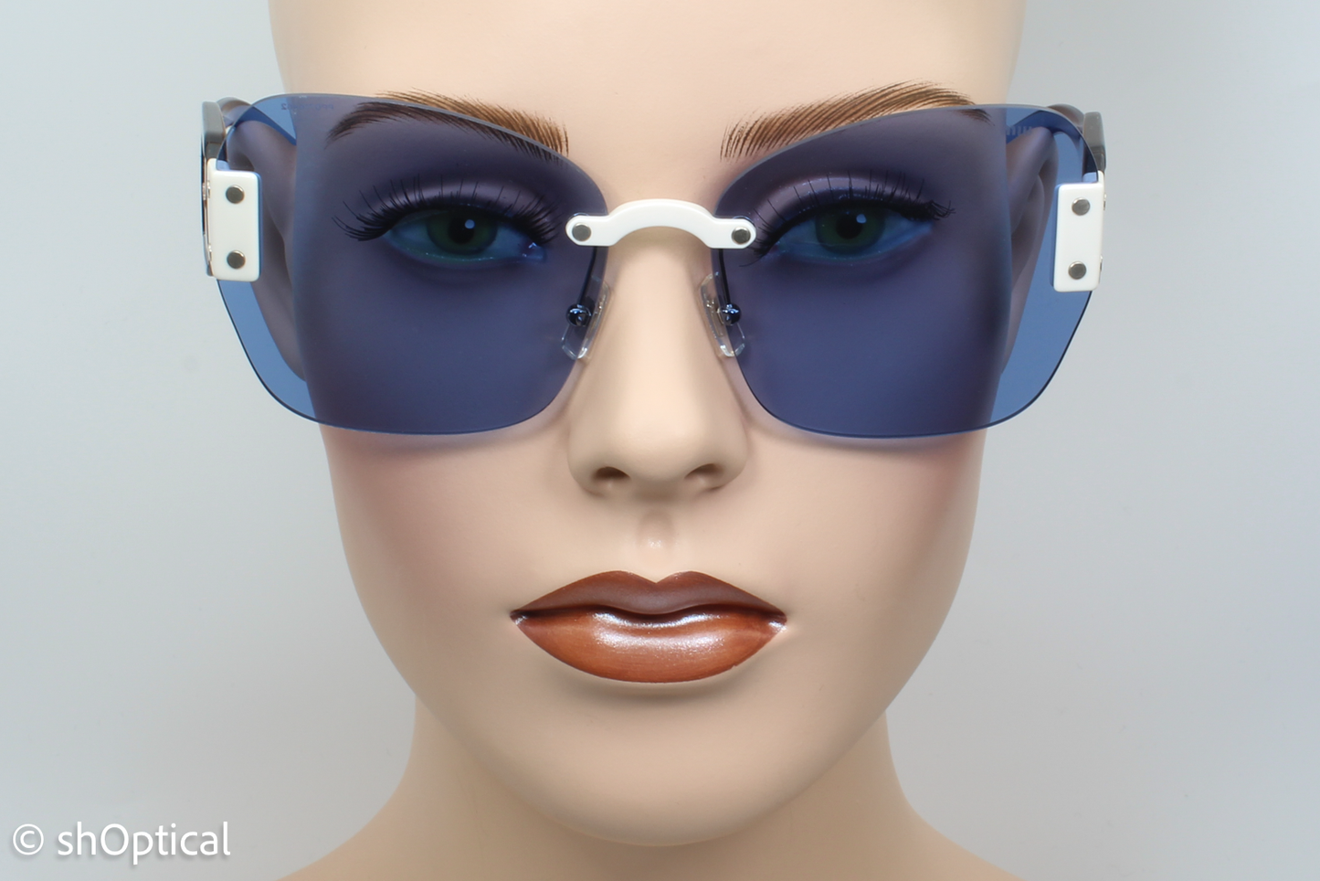 Miu Miu SMU08S VIU-2J1 Womens Rimless Sunglasses Transparent Blue 63mm