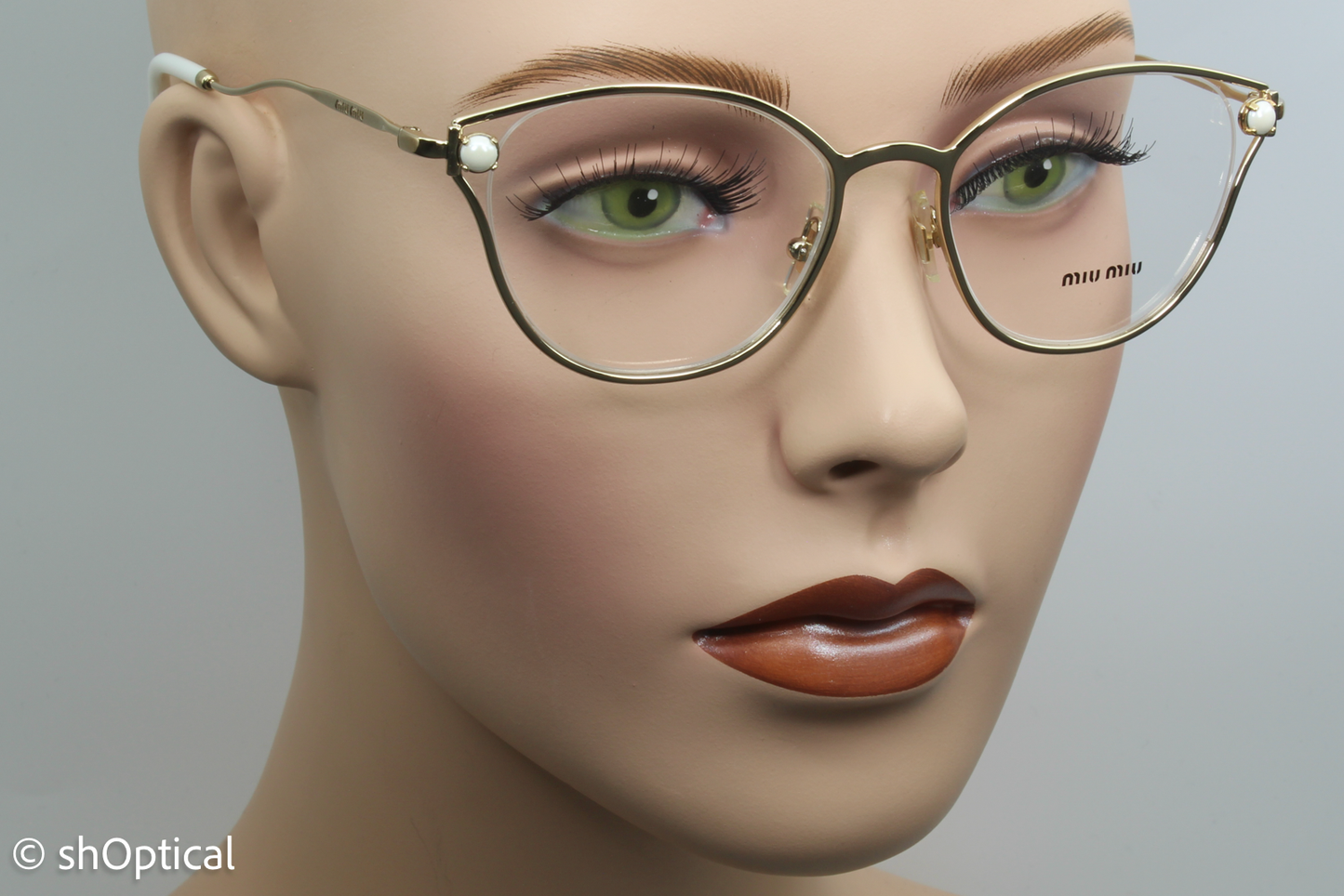 Miu Miu VMU530  Female Oval Glasses Frame Gold 50mm