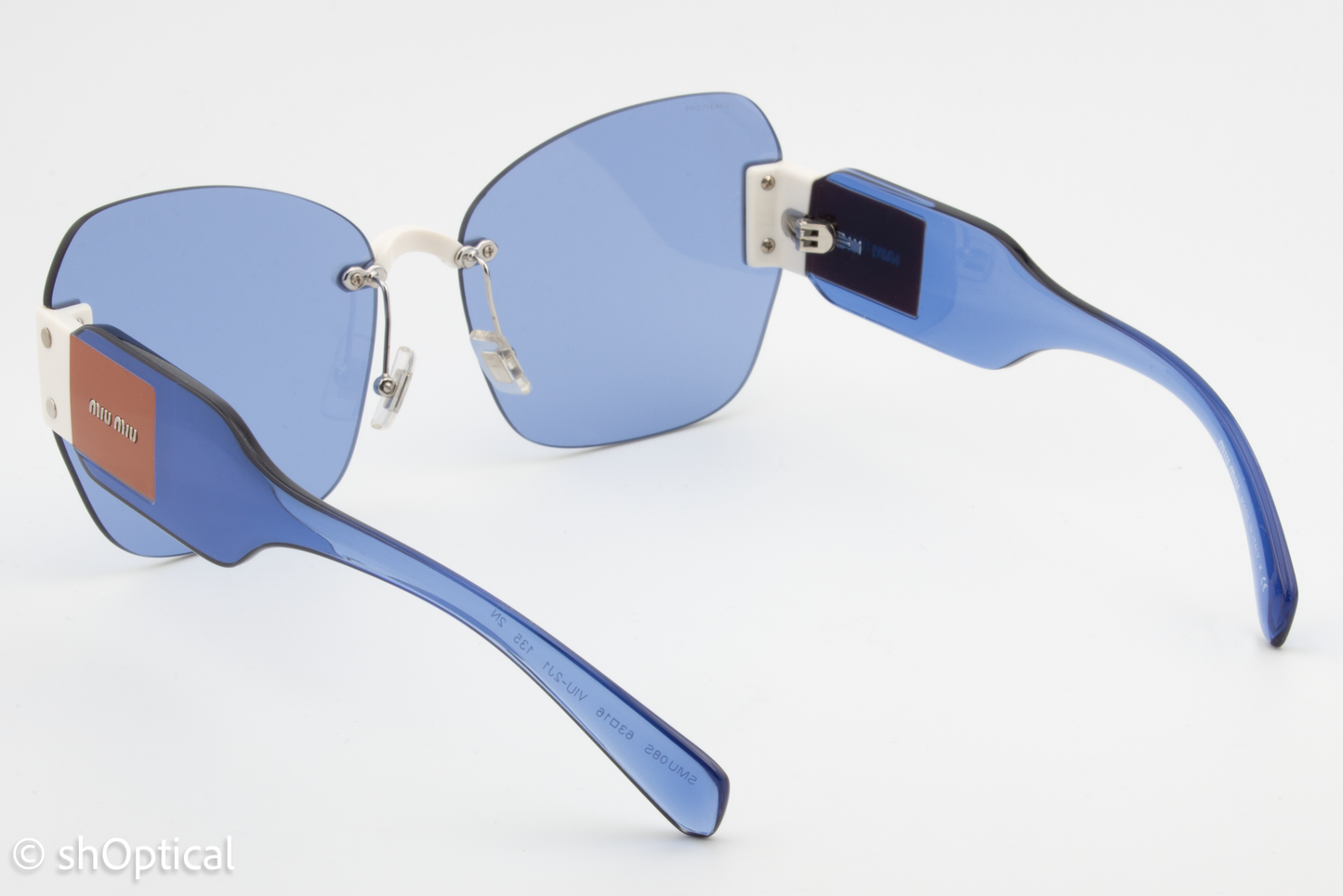 Miu Miu SMU08S VIU-2J1 Womens Rimless Sunglasses Transparent Blue 63mm