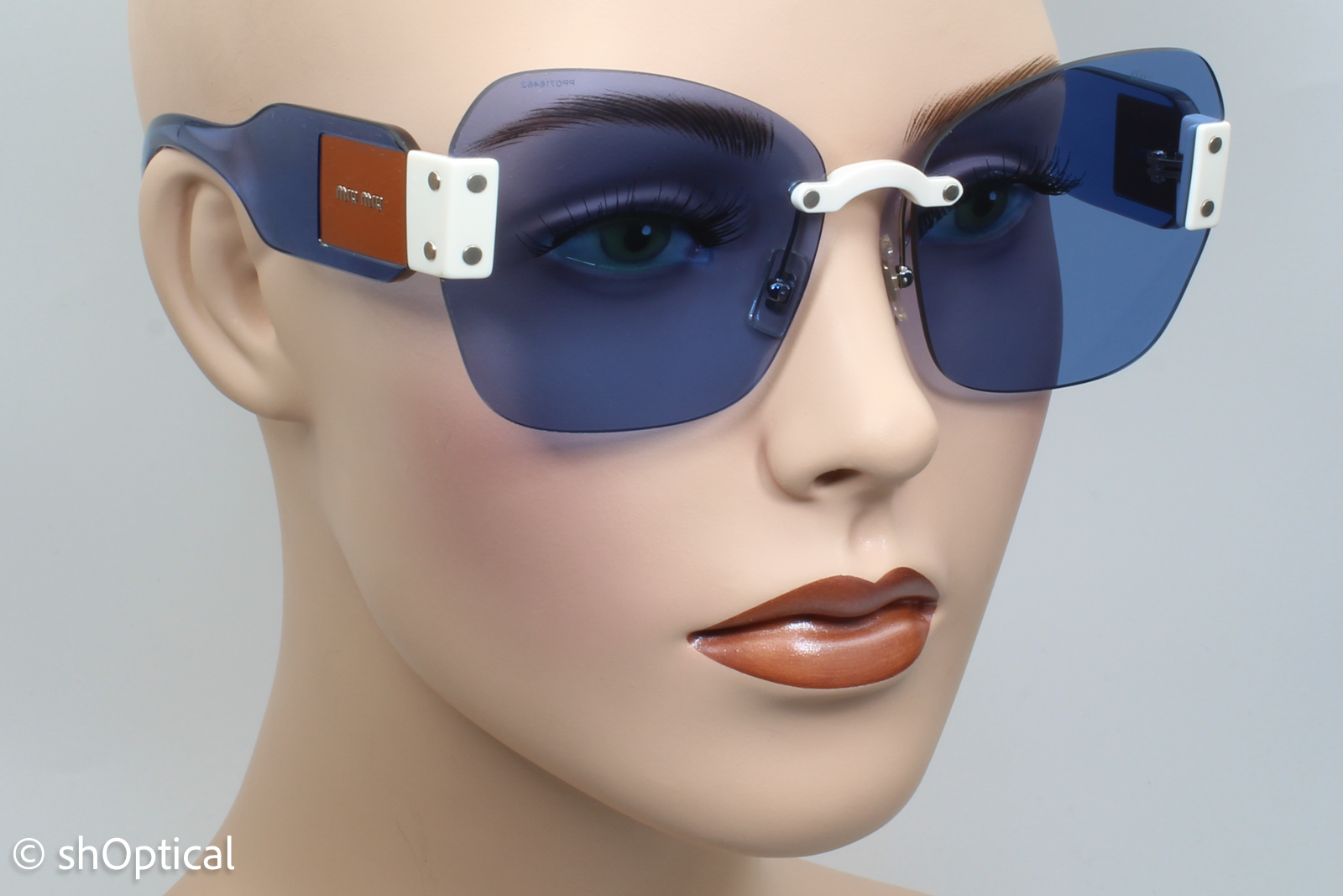 Miu Miu SMU08S VIU-2J1 Womens Rimless Sunglasses Transparent Blue 63mm