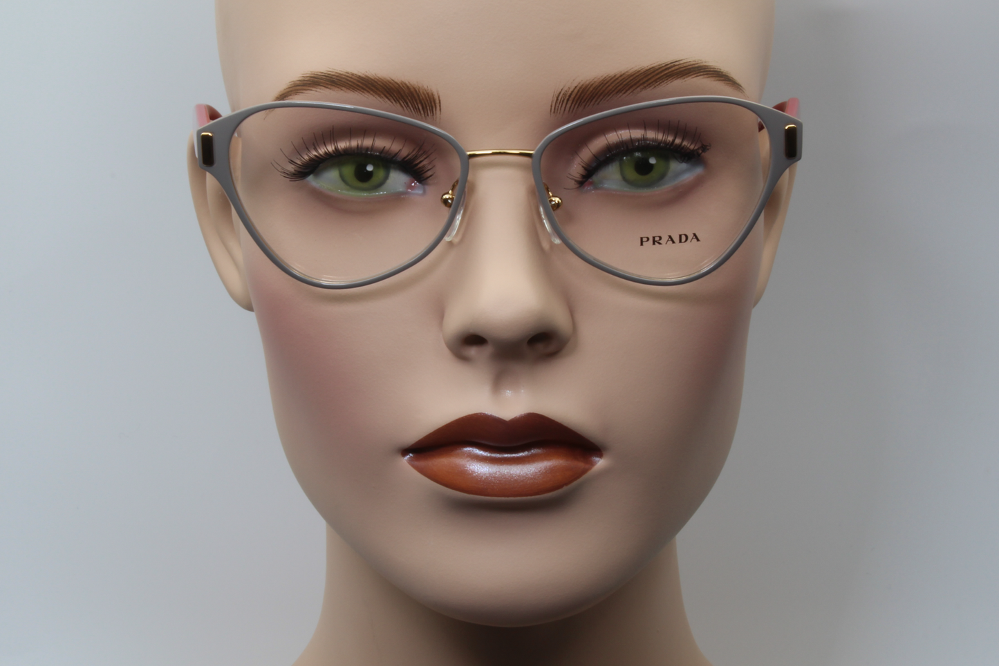 Prada VPR58U  Female Cat Eye Glasses Frame Grey, Pink 53mm