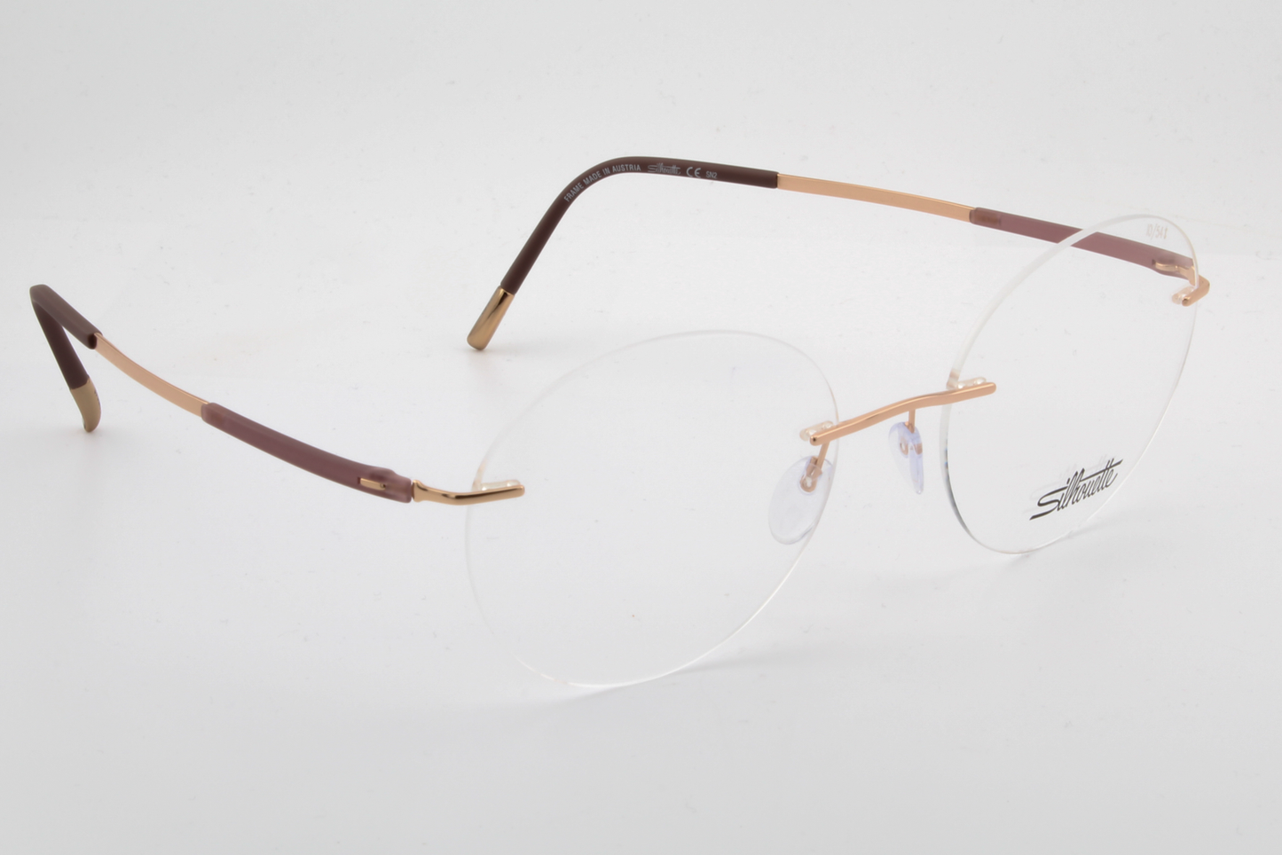 Silhouette 5540 Titan Dynamics Contour (IO)  Female Round Glasses Frame Cassis Sundown 54mm